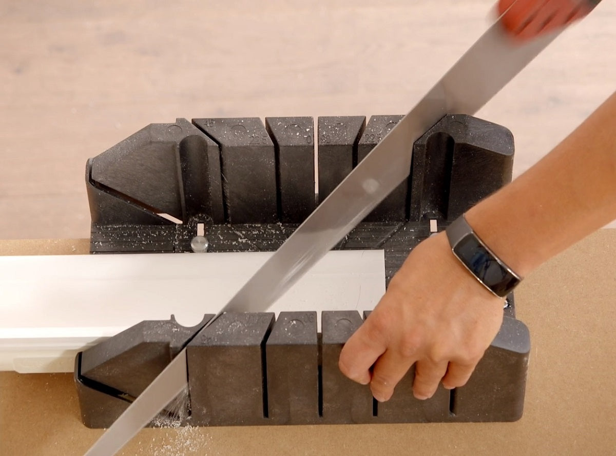 FB13 adjustable coving mitre box with a saw.